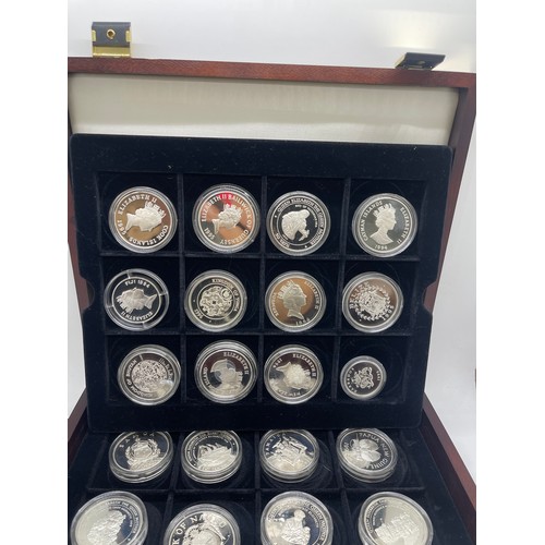 503 - Cased H.M Queen Elizebeth the Queen Mother silver coin set with coas