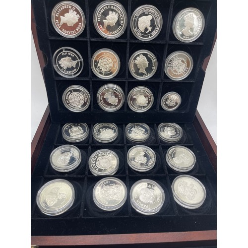 503 - Cased H.M Queen Elizebeth the Queen Mother silver coin set with coas