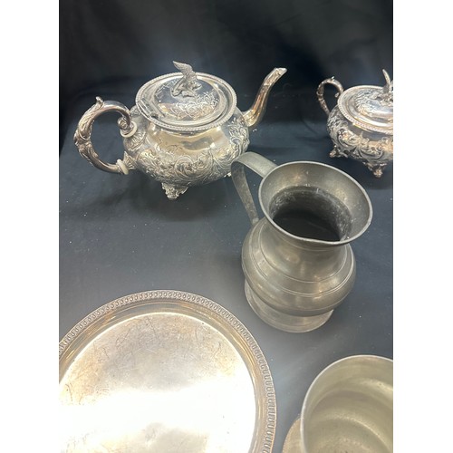 59 - Selection of metalware to include EPNS tea pots etc