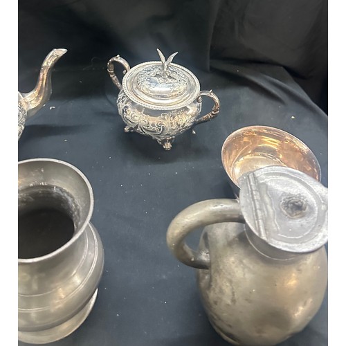 59 - Selection of metalware to include EPNS tea pots etc