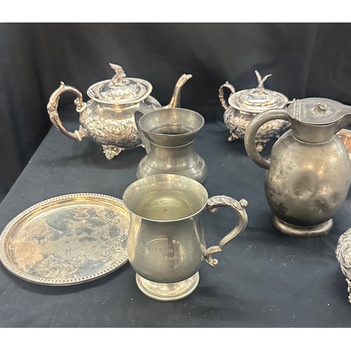 59 - Selection of metalware to include EPNS tea pots etc