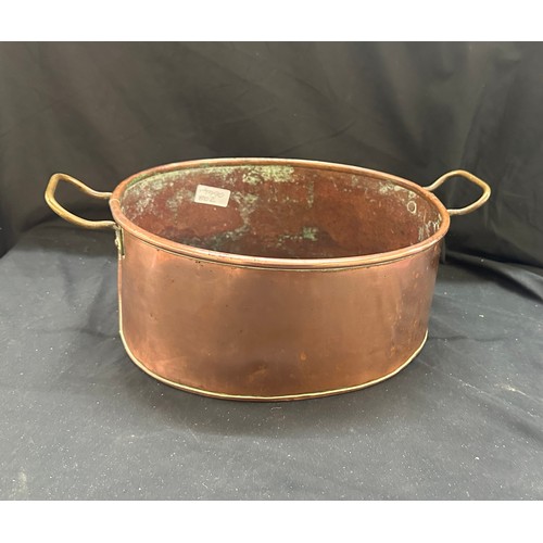 106 - Vintage copper cooking pot measures approx 5.5 inches tall by 12 long and 10 wide