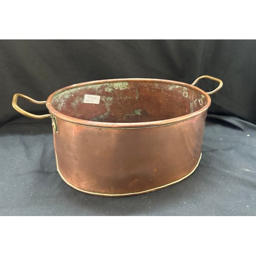 106 - Vintage copper cooking pot measures approx 5.5 inches tall by 12 long and 10 wide