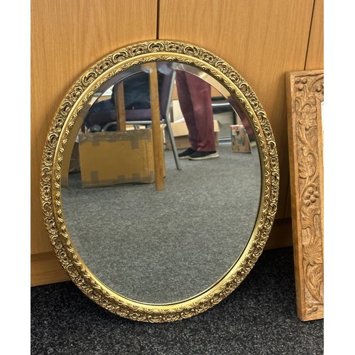 20 - Two mirrors one gilt the other carved wooden largest measures approx 23 inches tall