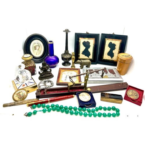 510 - Selection of collectables to include silhouette framed ladies, vase, trinket, pen, buckle etc