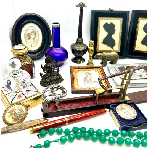 510 - Selection of collectables to include silhouette framed ladies, vase, trinket, pen, buckle etc