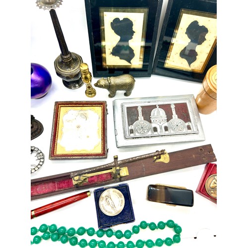 510 - Selection of collectables to include silhouette framed ladies, vase, trinket, pen, buckle etc