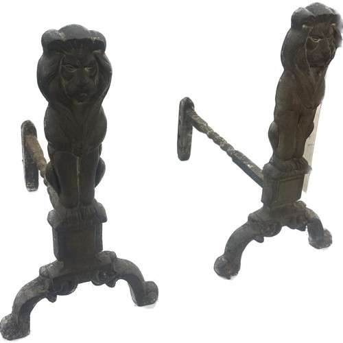 278 - Pair of brass lion fire dogs measures approx 17 inches wide by 17 inches tall