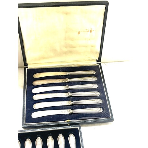 530 - Three cased sets of silver handles butter knives