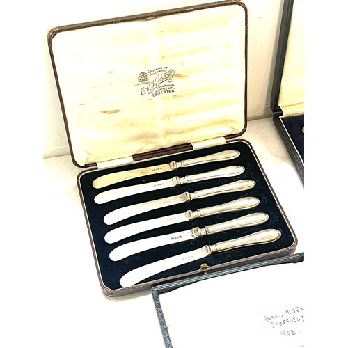 530 - Three cased sets of silver handles butter knives