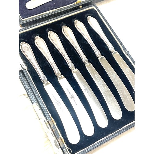 530 - Three cased sets of silver handles butter knives