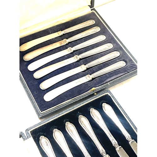 530 - Three cased sets of silver handles butter knives