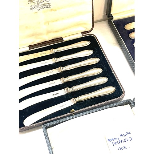 530 - Three cased sets of silver handles butter knives