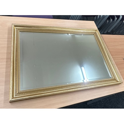 219 - Gilded bevel mirror, approximate measurements: 32 by 23 inches