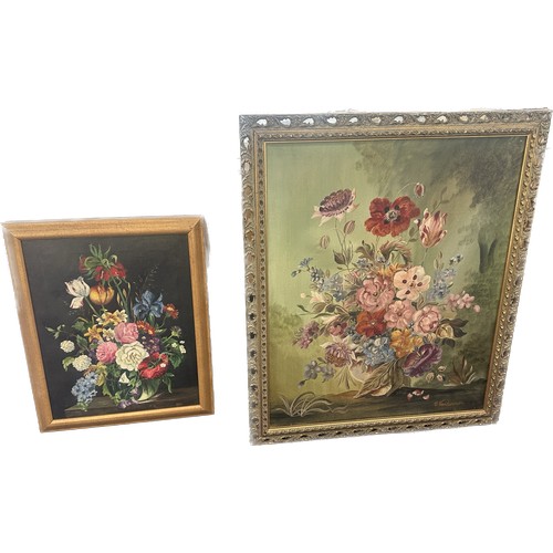 257 - 2 Framed oil on canvases depicting flowers, largest measures approximately 24 by 39 inches and is si... 