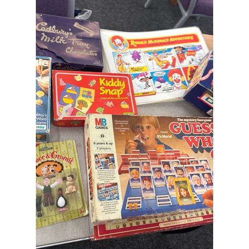 223 - Selection vintage and later childrens toys and games to include McDonalds, Boggle, Top trumps, board... 