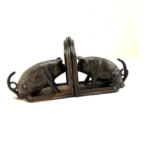 575 - Pair of cast iron pig book ends