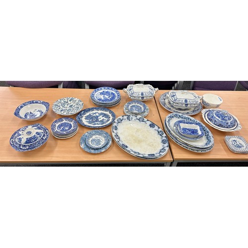 224 - Large selection of blue and white pottery to include meat plates, tureens etc