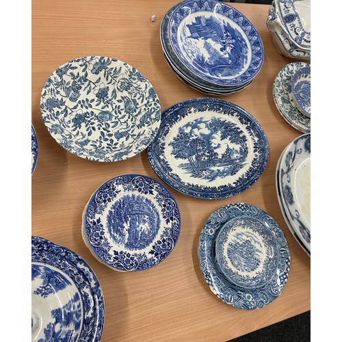 224 - Large selection of blue and white pottery to include meat plates, tureens etc