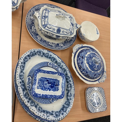 224 - Large selection of blue and white pottery to include meat plates, tureens etc