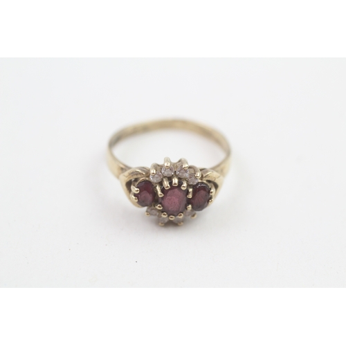 183 - 9ct gold garnet and cubic zirconia cluster dress ring (2.5g)