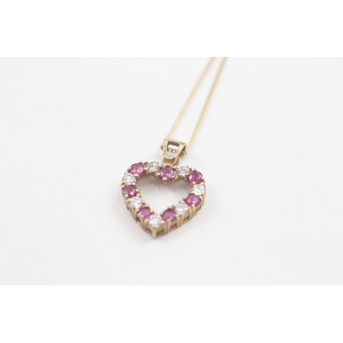 185 - 9ct gold ruby and cubic zirconia heart pendant with 9ct gold chain (1.8g)