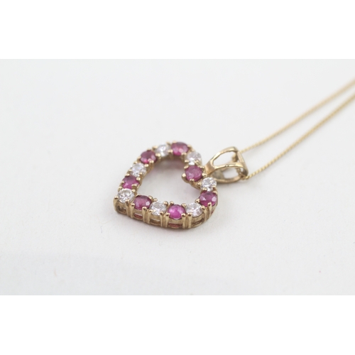 185 - 9ct gold ruby and cubic zirconia heart pendant with 9ct gold chain (1.8g)