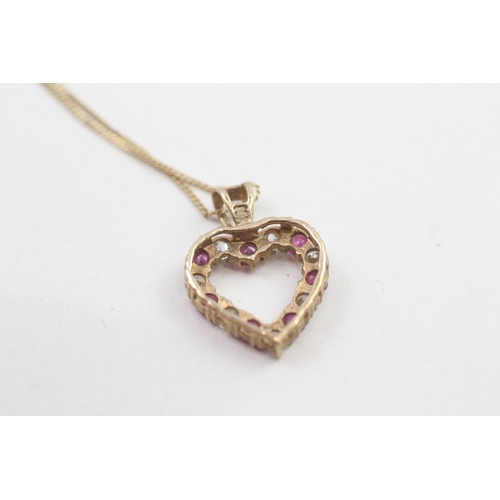 185 - 9ct gold ruby and cubic zirconia heart pendant with 9ct gold chain (1.8g)