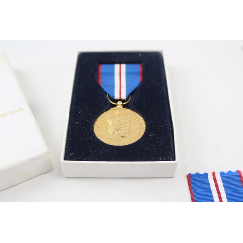 379 - Boxed ER.II Queens Golden Jubilee Medal with C.O.A