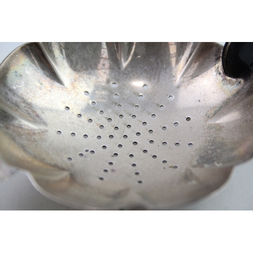 84 - .925 sterling silver tea strainer