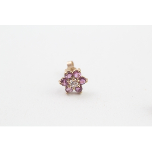 156 - 9ct gold ruby & cubic zirconia floral cluster stud earrings (1.2g)