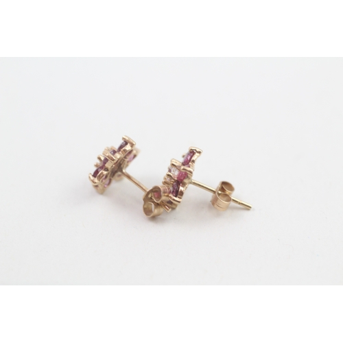 156 - 9ct gold ruby & cubic zirconia floral cluster stud earrings (1.2g)