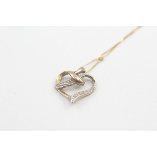 164 - 9ct gold diamond heart shaped pendant necklace (1.3g)