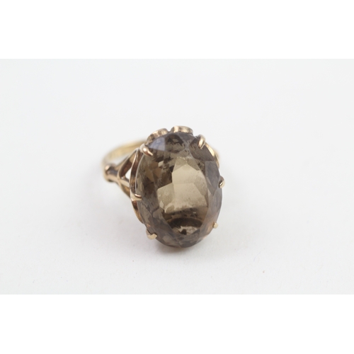 180 - 9ct gold smokey quartz dress ring (5.6g)