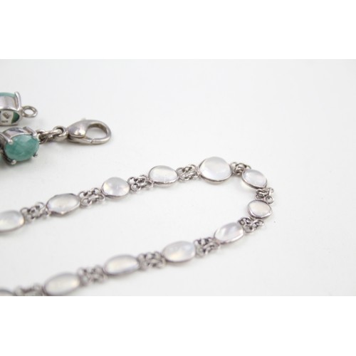 285 - A silver moonstone bracelet and an emerald tennis bracelet (33g)