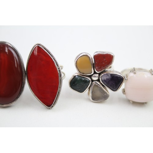 287 - Four silver stone set cocktail rings (33g)