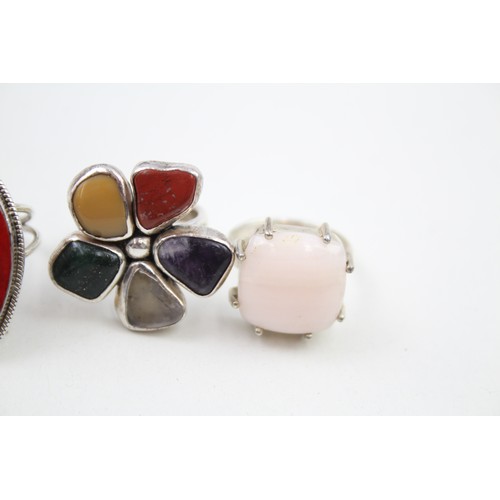 287 - Four silver stone set cocktail rings (33g)