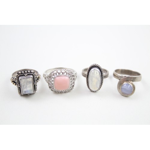 288 - Four silver stone set rings including moonstone (22g)