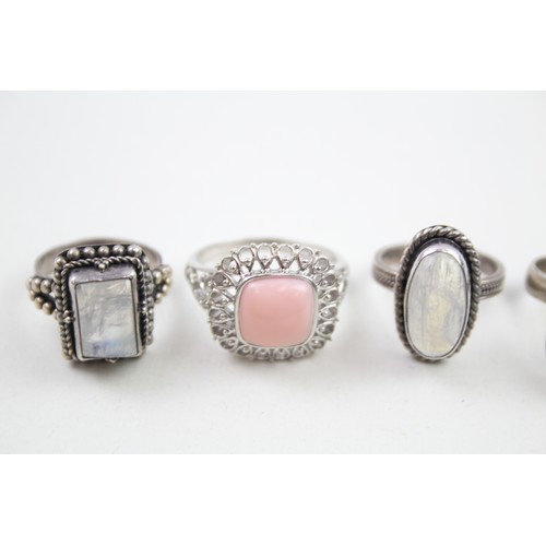 288 - Four silver stone set rings including moonstone (22g)