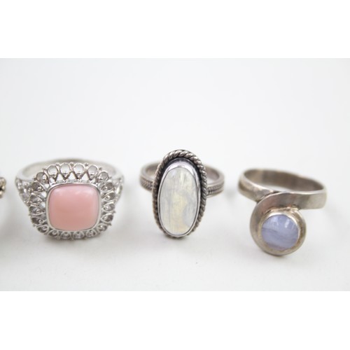 288 - Four silver stone set rings including moonstone (22g)