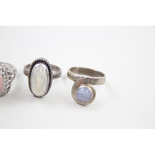 288 - Four silver stone set rings including moonstone (22g)