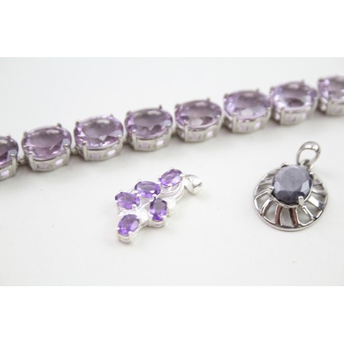 289 - A collection of stone set silver jewellery including an amethyst tennis bracelet (39g)