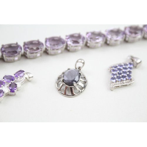 289 - A collection of stone set silver jewellery including an amethyst tennis bracelet (39g)