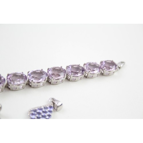 289 - A collection of stone set silver jewellery including an amethyst tennis bracelet (39g)