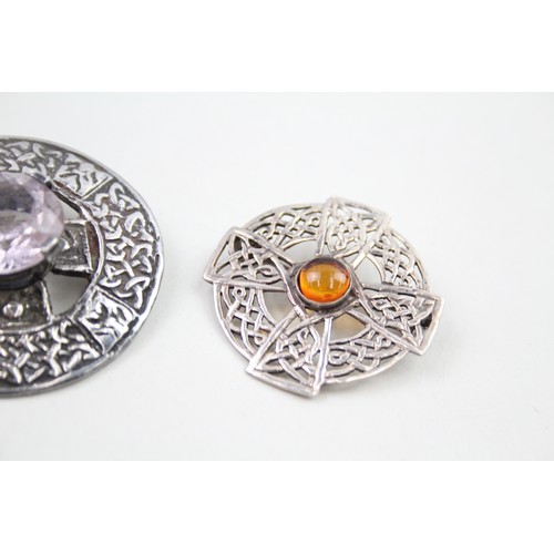 298 - Three Scottish silver brooches (37g)