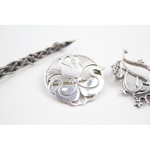 299 - Four Scottish silver brooches including Shetland silver (25g)