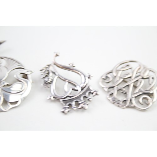 299 - Four Scottish silver brooches including Shetland silver (25g)