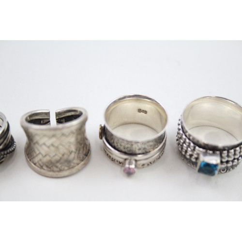 307 - Four silver statement rings (29g)