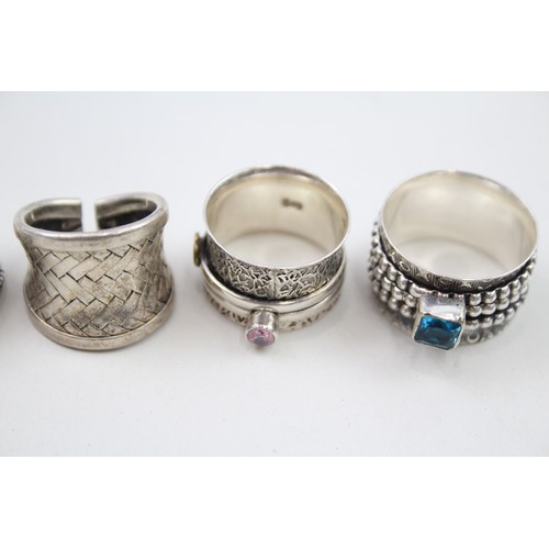 307 - Four silver statement rings (29g)