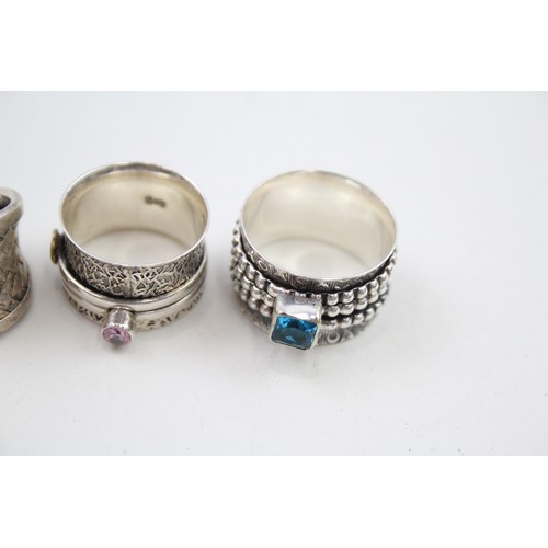 307 - Four silver statement rings (29g)